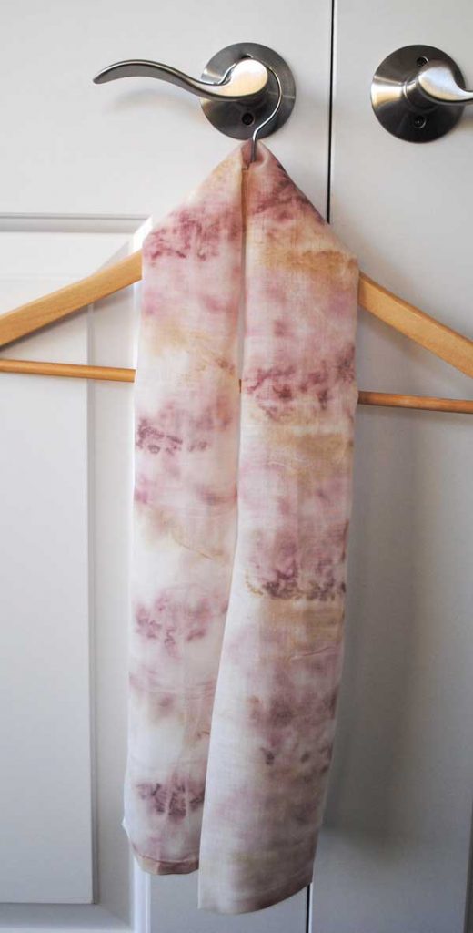 scarf created  by dyeing fabric with petals